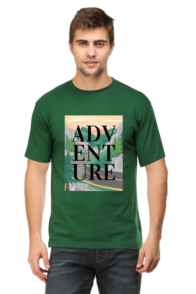 green tshirt with a design of mountains and a road with adventure written on it