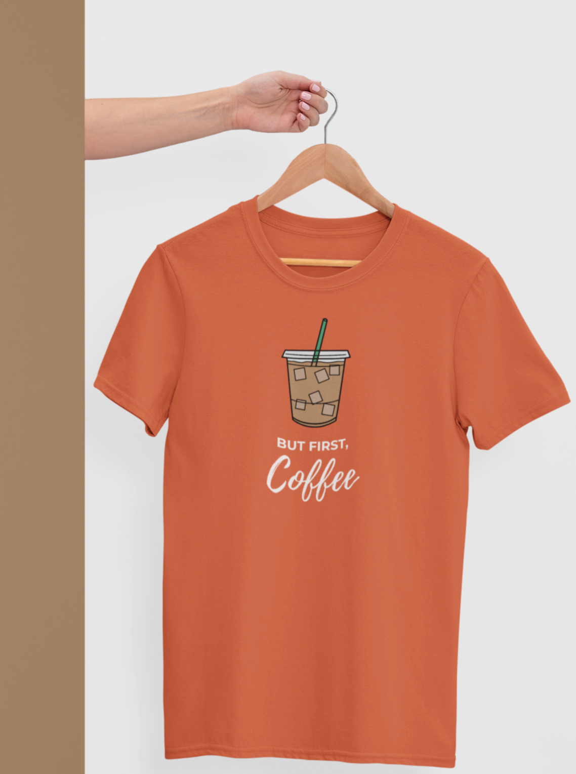 cute coral tshirt for coffee lovers with text 'but first coffee' written in white