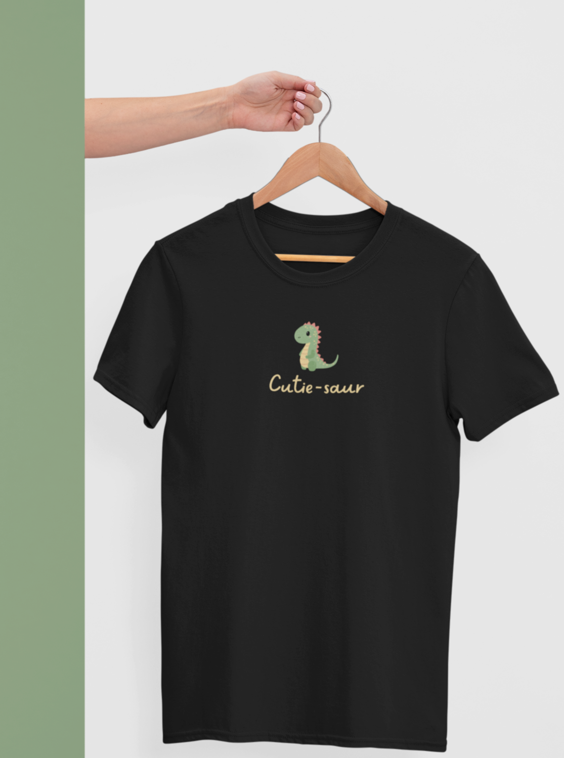 black cute shirt with text 'cutie-saur' written and an image of cute dinosaur